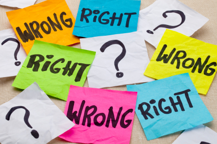 wrong or right dilemma or ethical question - handwriting on colorful sticky notes