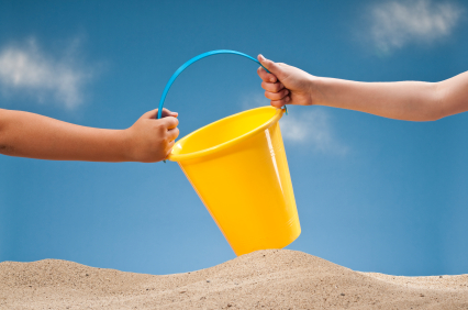 Sand bucket - children sharing